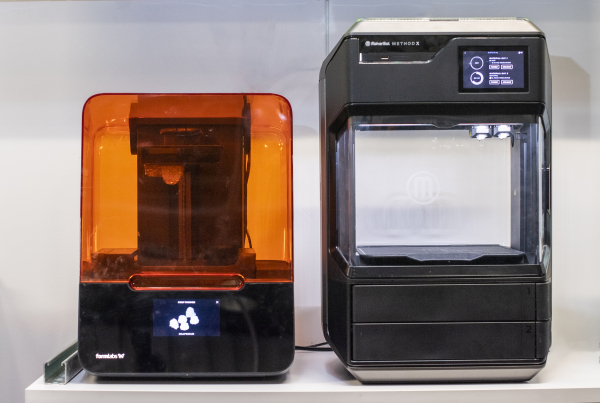 Small printers used for research sitting side by side