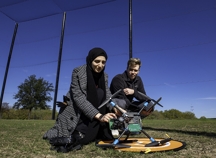 Photo of UNT student researchers conducting research in the drone facility